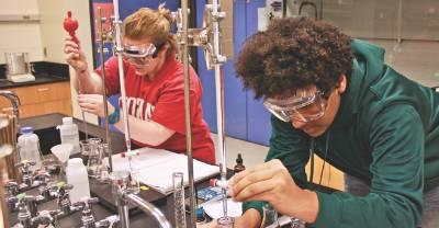 Students working in a chemistry laboratory.